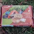 package of Girl Scout S’mores cookies on grass