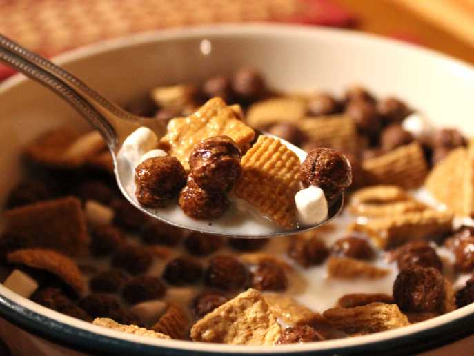 spoonful of Golden Grahams and Cocoa Puffs s’mores cereal