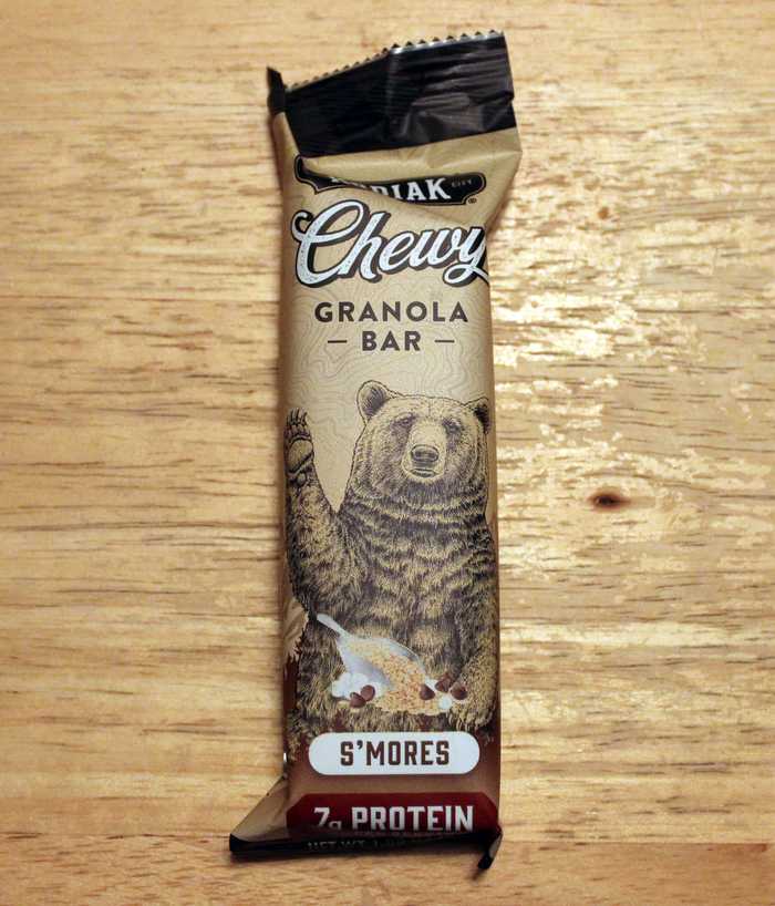 bear with scoop of marshmallows on wrapper of granola bar
